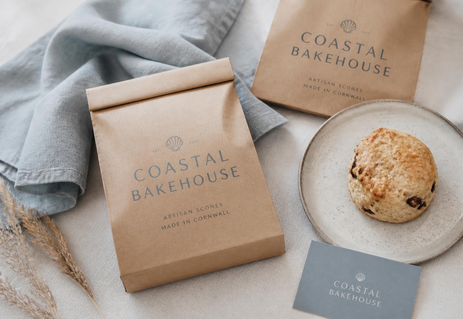 Coastal bakehouse packaging and brand collateral photographed in natural light